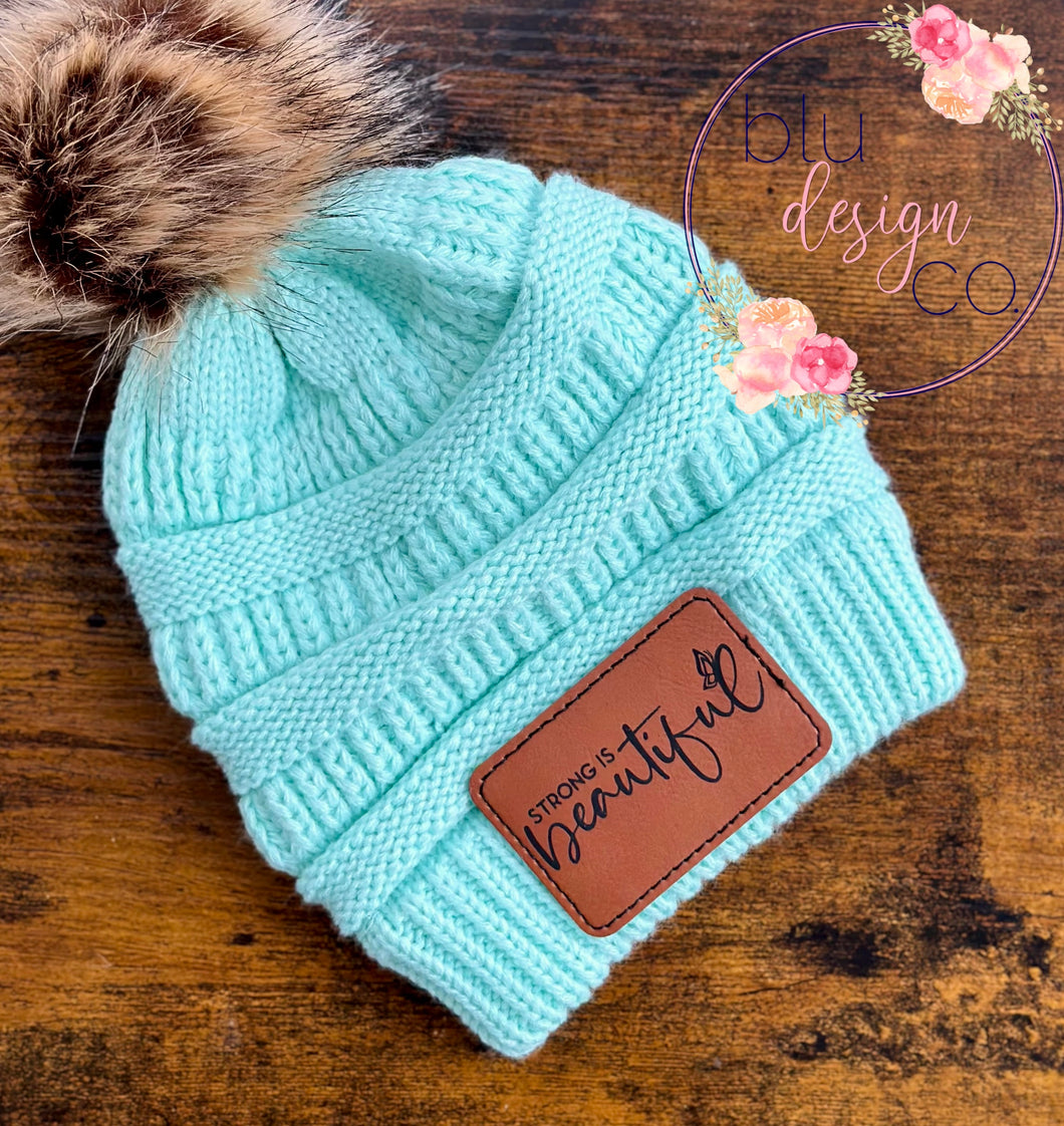 Strong is Beautiful Leather Patch Pom Pom Beanie